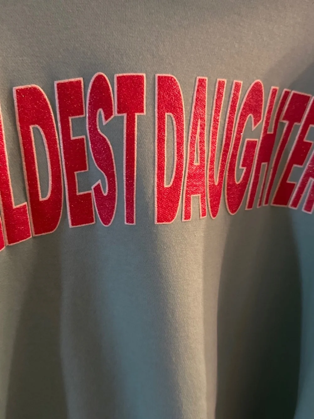 Taylor Swift “Eldest Daughter” Life of a Showgirl Teal and Red lettering